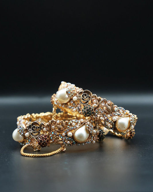 Experience timeless elegance with our Regal Openable Multicolour Pearldrop Kara Set image 1