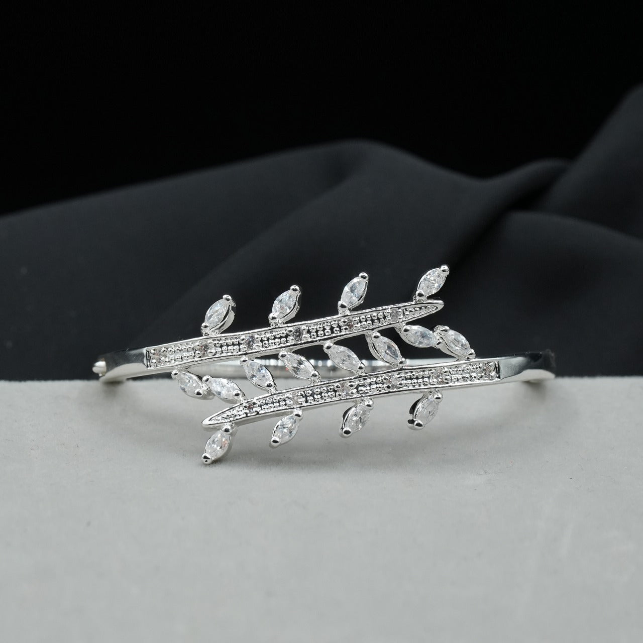 A stunning leaf-inspired pattern fency bracelet, featuring delicate branches adorned with shimmering stones - Shiny Silver image