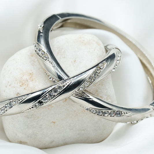 Embellished with small, sparkling cubic zirconia stones along the curves, adding a touch of glamour image 1