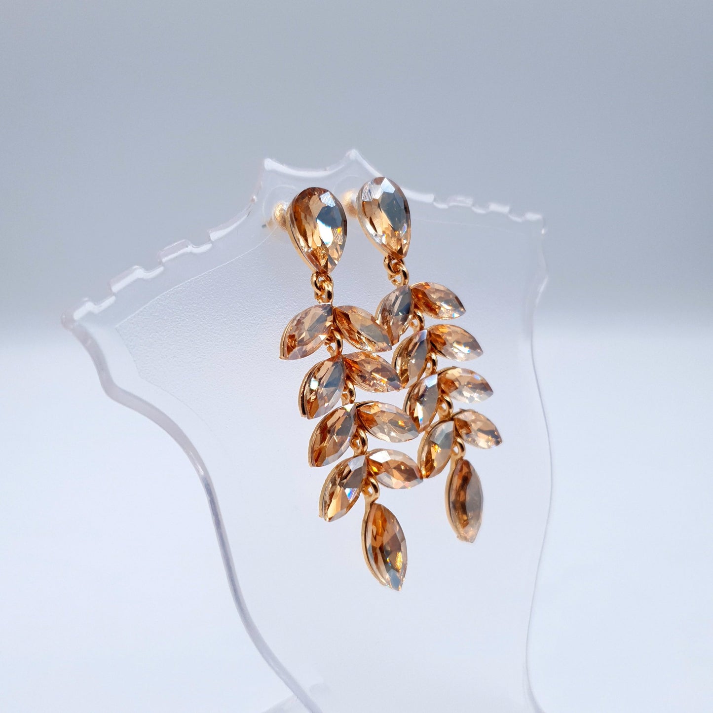 Elegant petal-shaped earrings adorned with sparkling rhinestones for a radiant, sophisticated look.(Golden = 2, Red = 1) image 6