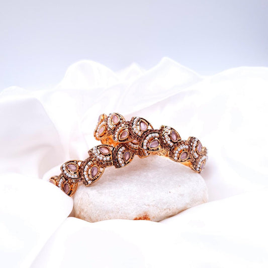 The allure of gemstone accents, these pair of bangles are designed to complement your unique style crafted with intricate details and adorned with a variety of vibrant and elegant hues image 1