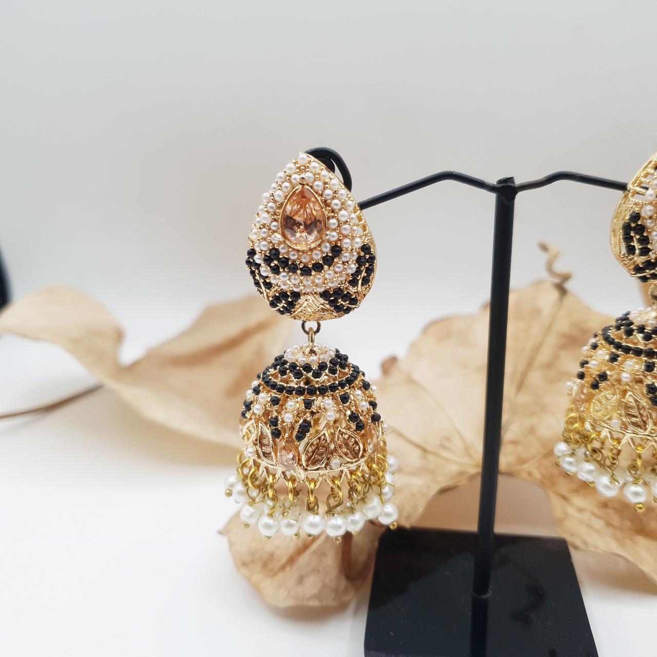 Discover timeless elegance with our Regal Pearldrop Jhumka Collection image 10