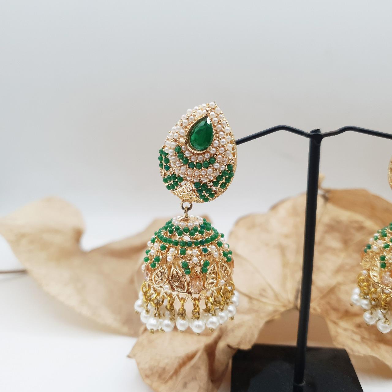 Discover timeless elegance with our Regal Pearldrop Jhumka Collection image 14