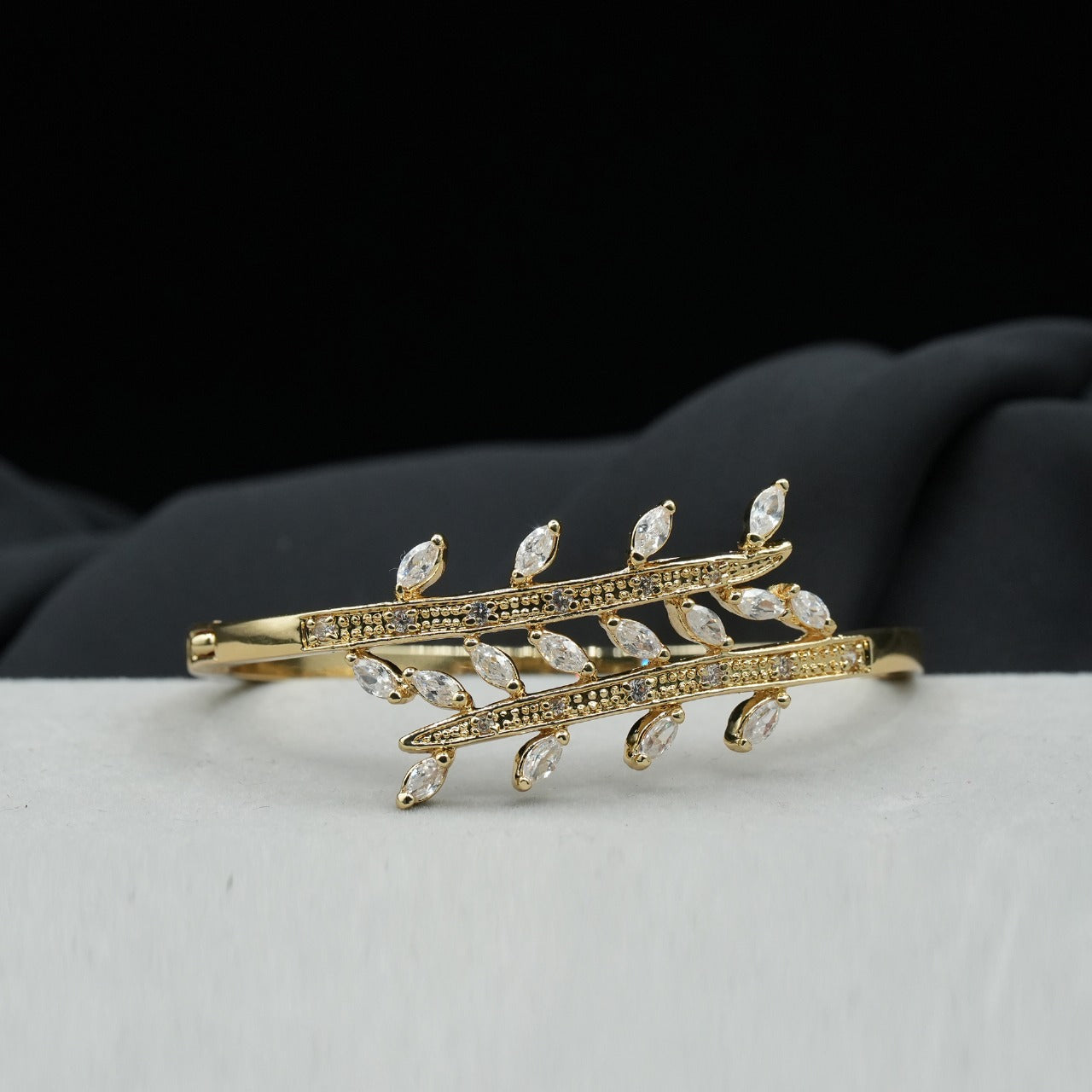 A stunning leaf-inspired pattern fency bracelet, featuring delicate branches adorned with shimmering stones - Shiny Golden image