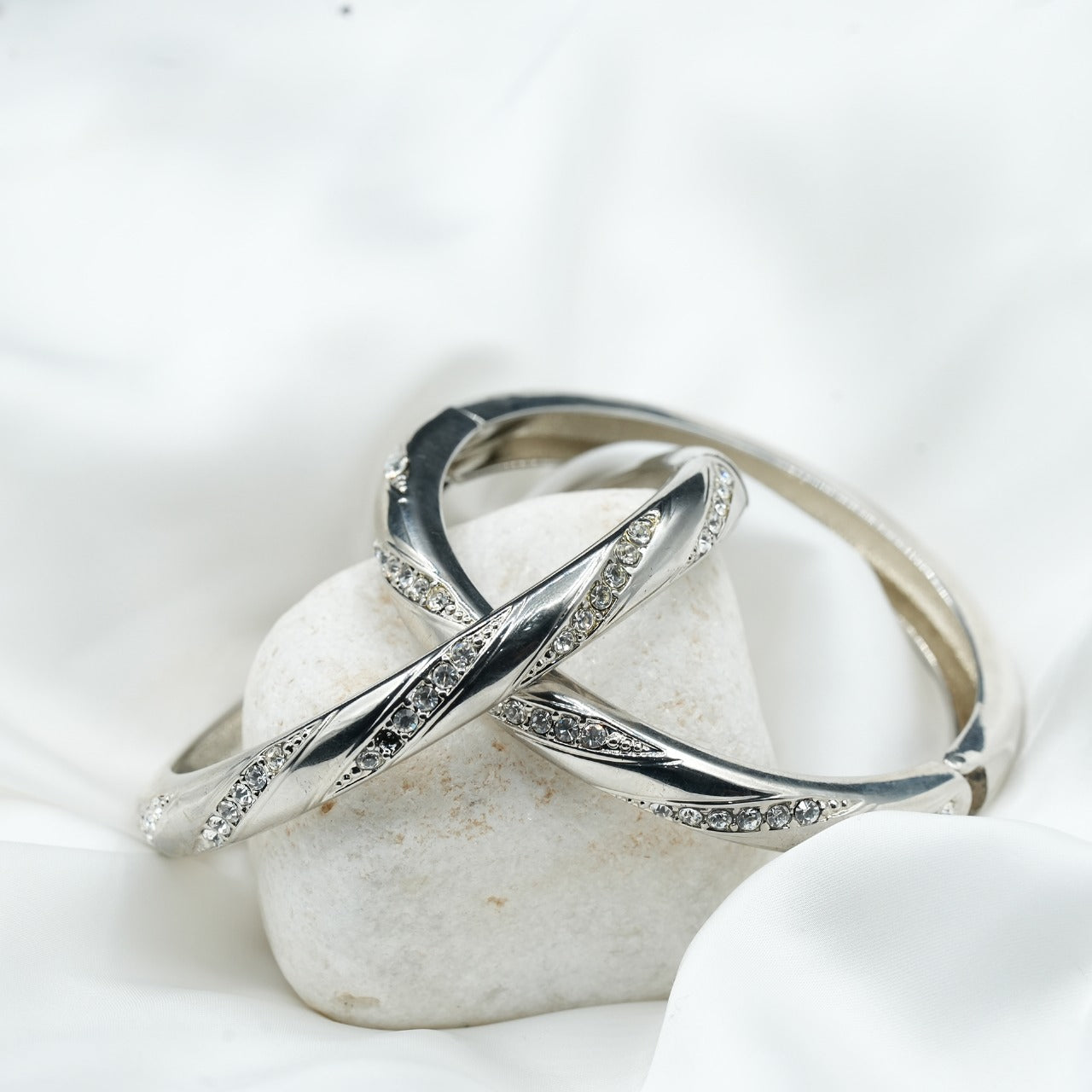 Embellished with small, sparkling cubic zirconia stones along the curves, adding a touch of glamour image 3