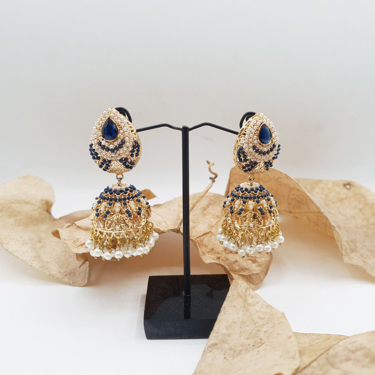 Discover timeless elegance with our Regal Pearldrop Jhumka Collection image 24