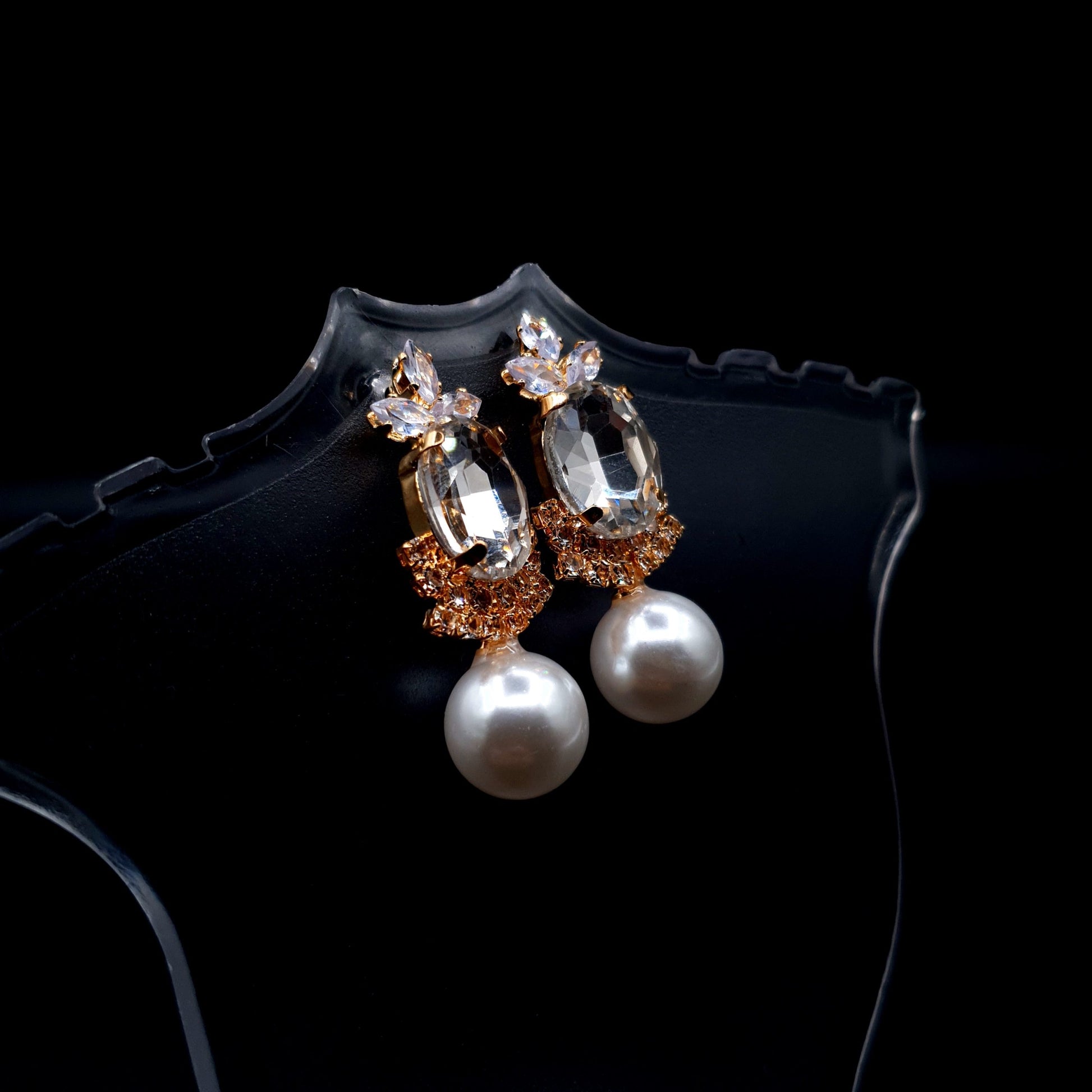 Stunning rhinestone earrings with a graceful drop-down pearl for a timeless and elegant charm.(Silver = 1, Champagne = 1) image 3