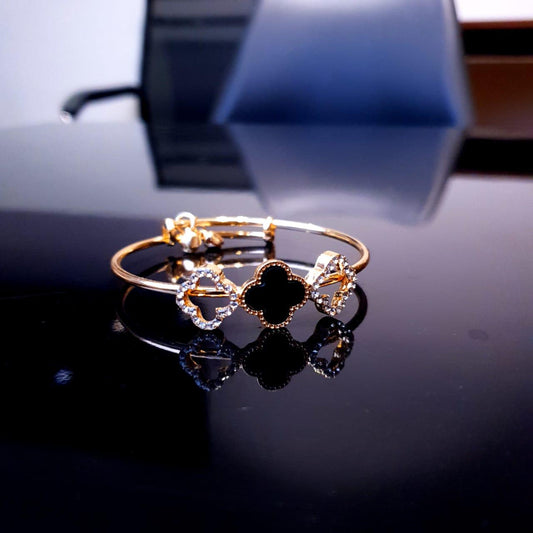 Golden Bracelet with Black Clover Charm image 1