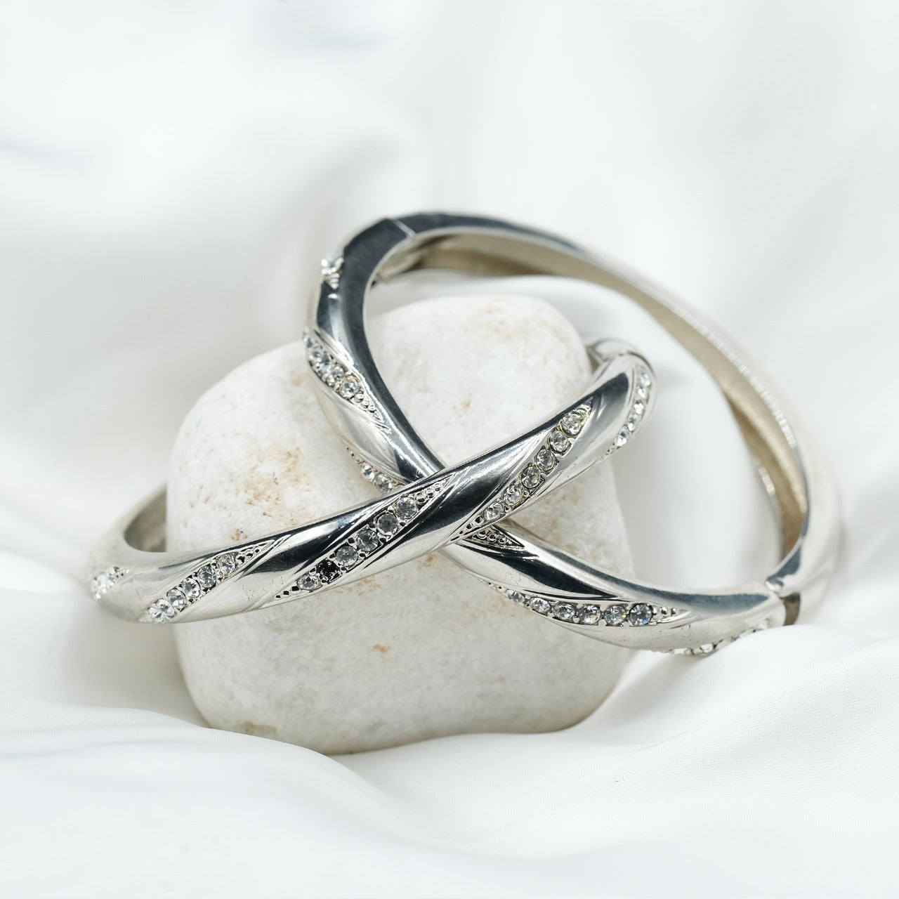 Embellished with small, sparkling cubic zirconia stones along the curves, adding a touch of glamour image 2