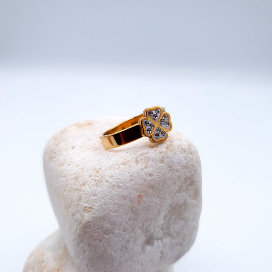 A stunning ring with heart accents in a delicate flower design, perfect for a beautiful gift image 1