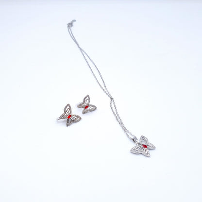butterfly pendant with a radiant red gem pairs beautifully with matching ear studs image 0