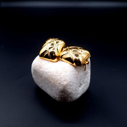 Sleek stainless steel square-shaped tops with a luxurious golden finish for a bold, modern look. image 4