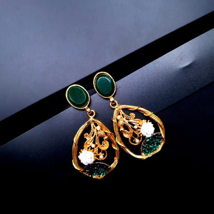oval-shaped gemstone at the top, followed by a delicate gold frame with decorative swirls, tiny pearls, and a small rose image 7