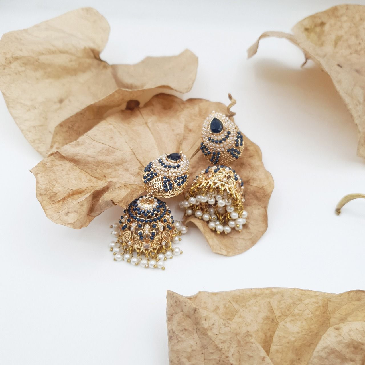 Discover timeless elegance with our Regal Pearldrop Jhumka Collection image 26