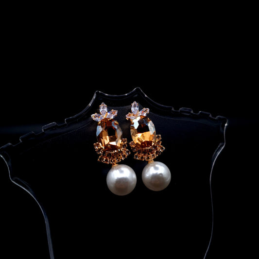 Stunning rhinestone earrings with a graceful drop-down pearl for a timeless and elegant charm.(Silver = 1, Champagne = 1) image 0