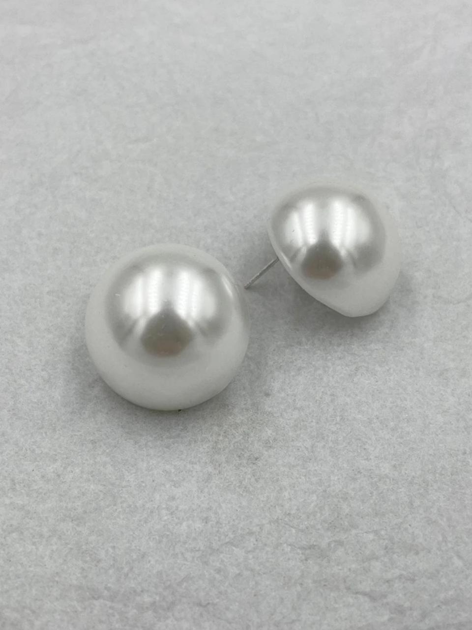 Elegant pearl stud add a timeless touch of sophistication to any outfit image 1