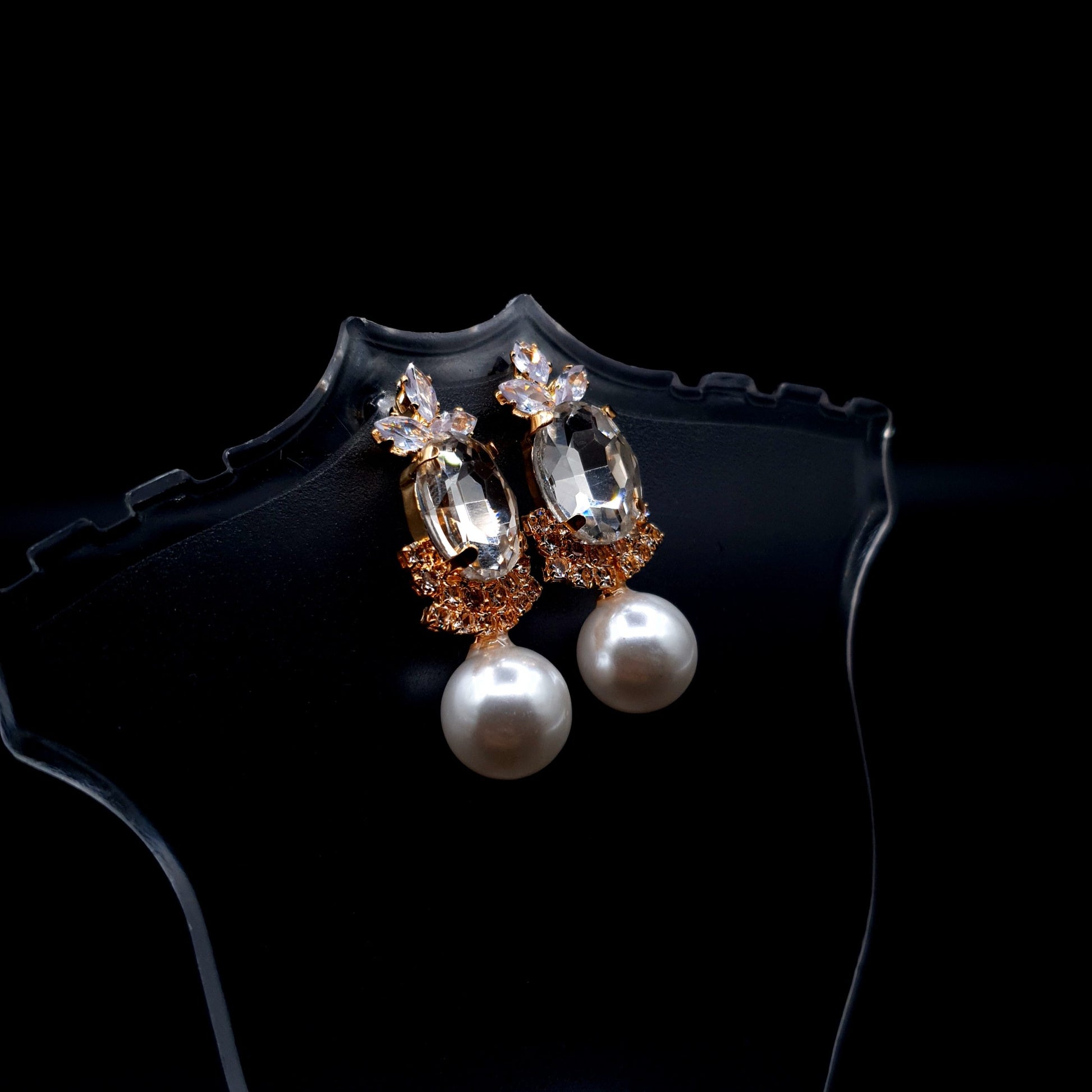 Stunning rhinestone earrings with a graceful drop-down pearl for a timeless and elegant charm.(Silver = 1, Champagne = 1) image 2