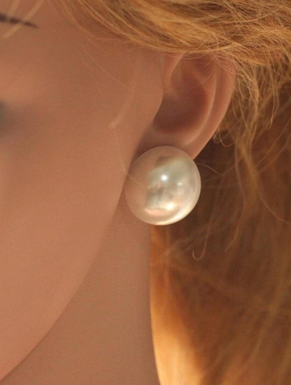 Elegant pearl stud add a timeless touch of sophistication to any outfit image 2