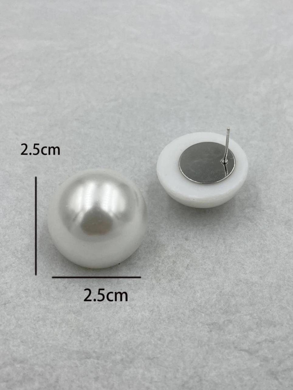 Elegant pearl stud add a timeless touch of sophistication to any outfit image 3