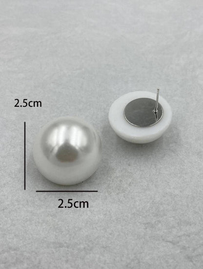 Elegant pearl stud add a timeless touch of sophistication to any outfit image 3