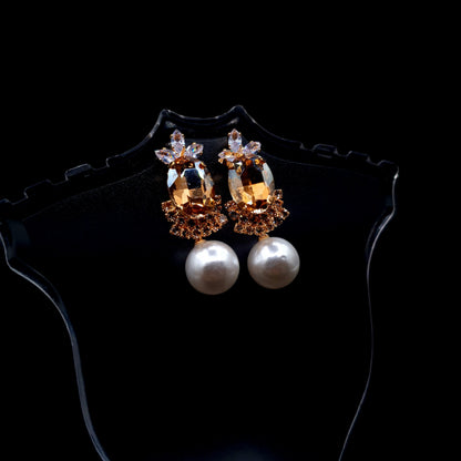 Stunning rhinestone earrings with a graceful drop-down pearl for a timeless and elegant charm.(Silver = 1, Champagne = 1) image 6