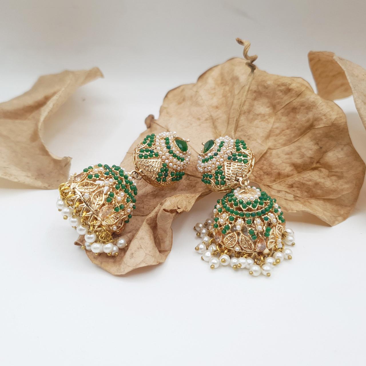 Discover timeless elegance with our Regal Pearldrop Jhumka Collection image 13