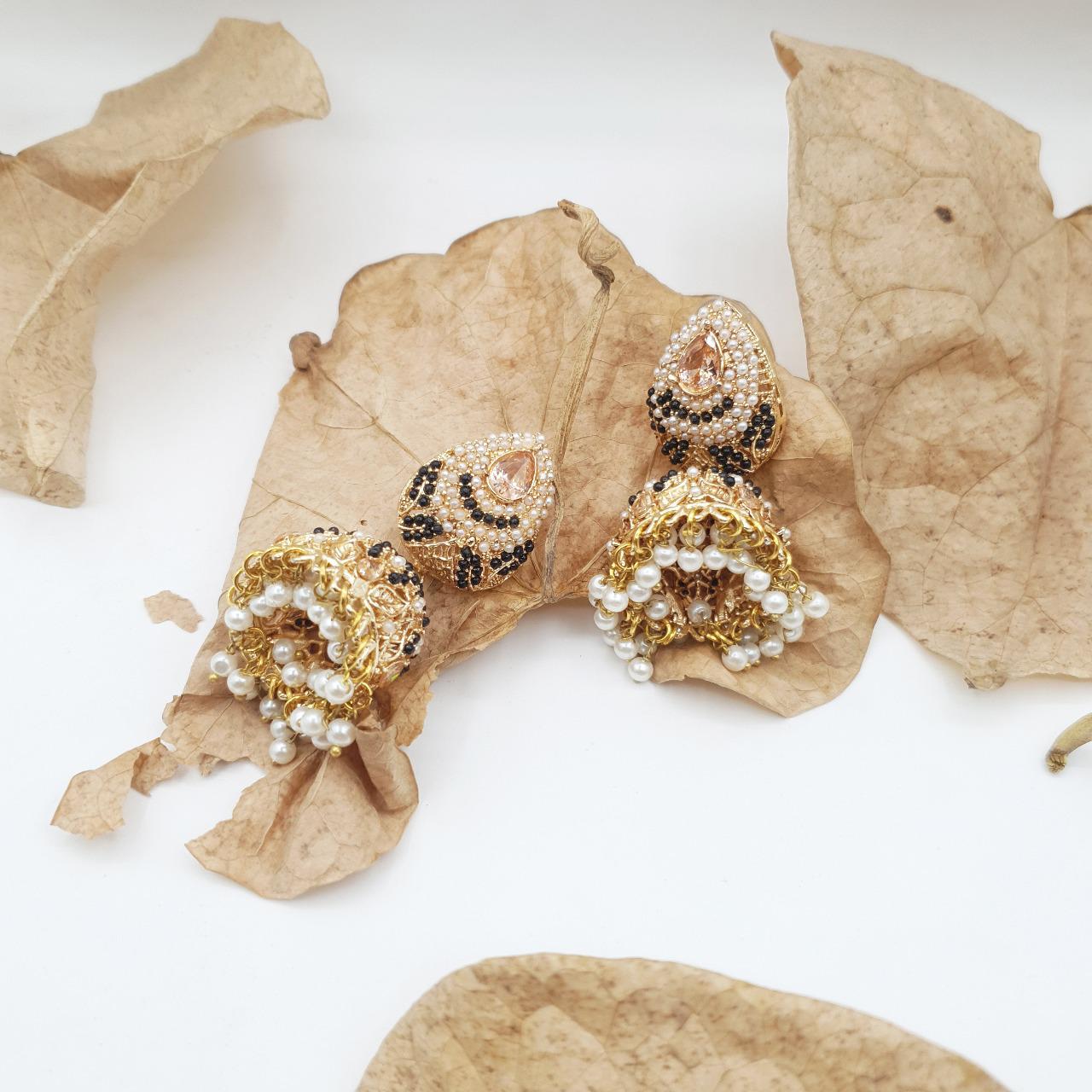 Discover timeless elegance with our Regal Pearldrop Jhumka Collection image 11