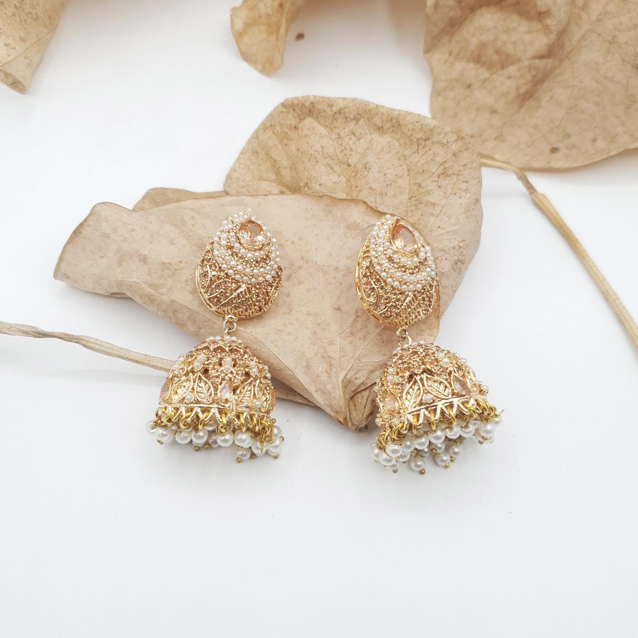 Discover timeless elegance with our Regal Pearldrop Jhumka Collection - SHAMPAGNE image