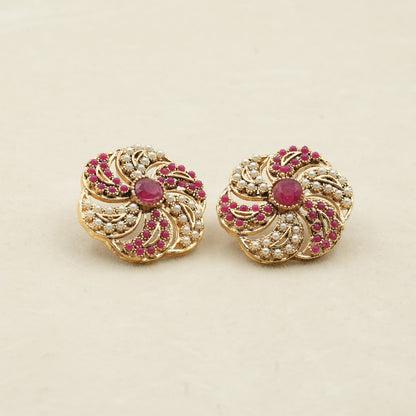 Likely gold-plated metal with a detailed filigree design image 1
