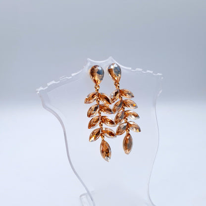 Elegant petal-shaped earrings adorned with sparkling rhinestones for a radiant, sophisticated look.(Golden = 2, Red = 1) image 5