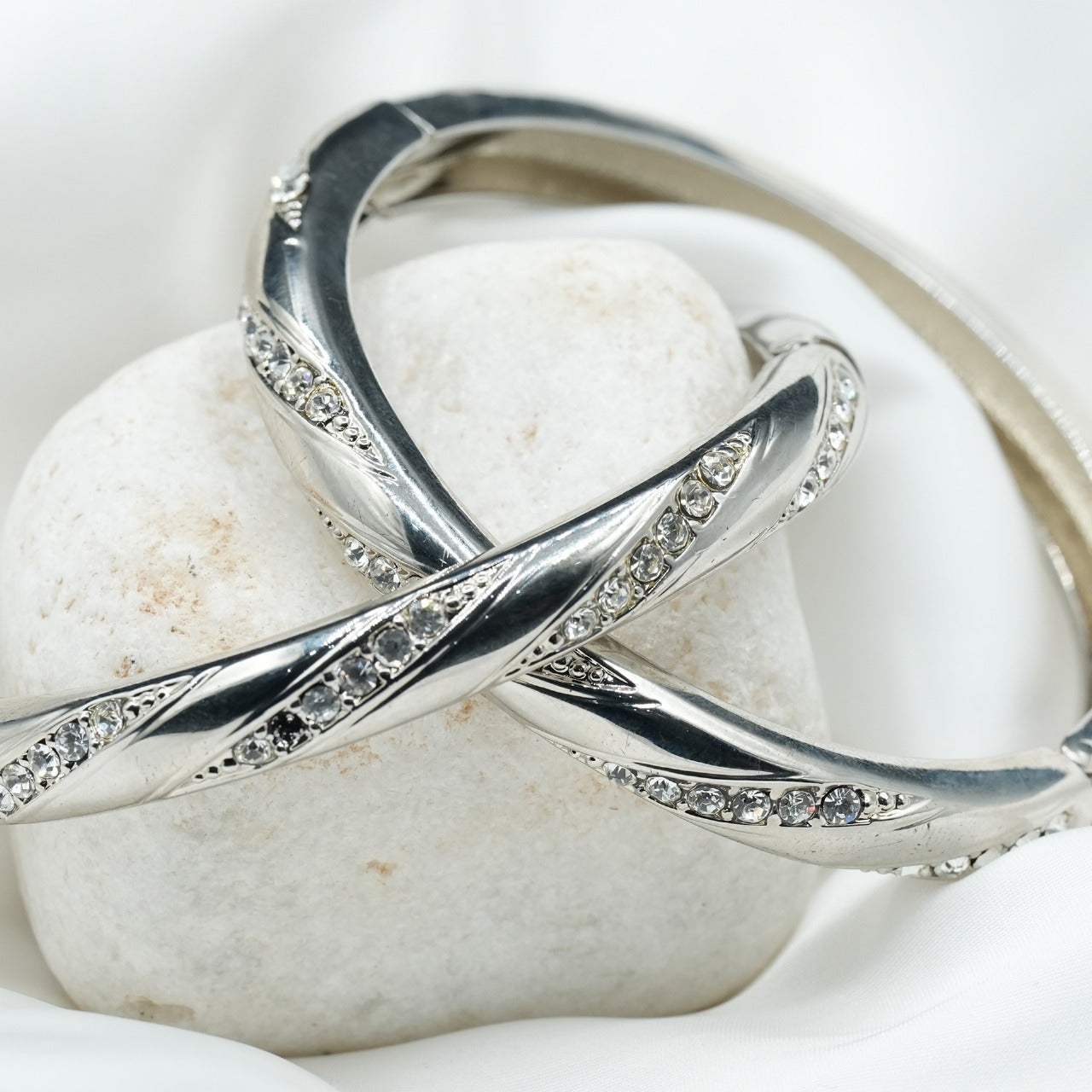 Embellished with small, sparkling cubic zirconia stones along the curves, adding a touch of glamour image 1