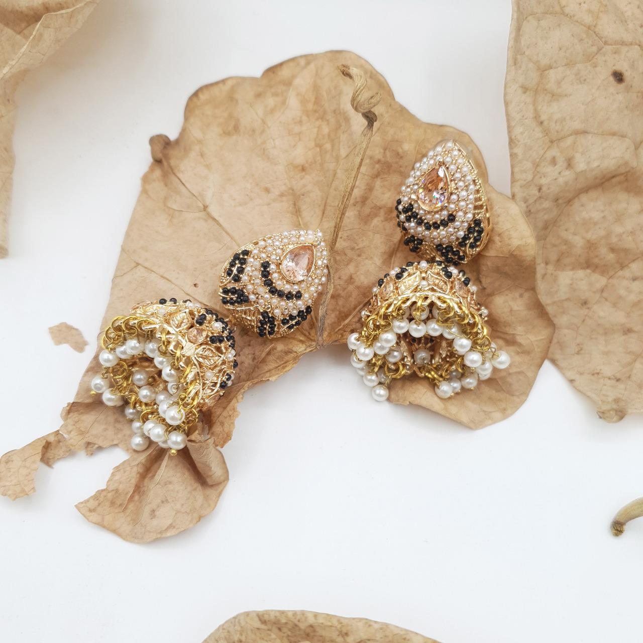 Discover timeless elegance with our Regal Pearldrop Jhumka Collection image 8