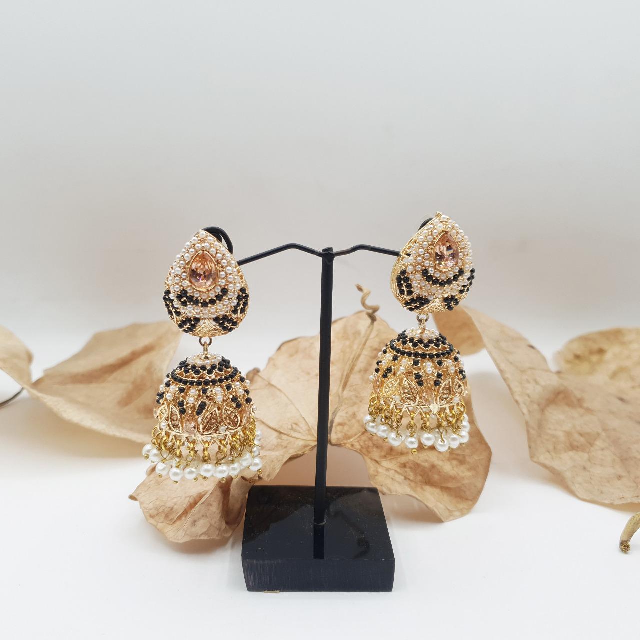 Discover timeless elegance with our Regal Pearldrop Jhumka Collection image 9