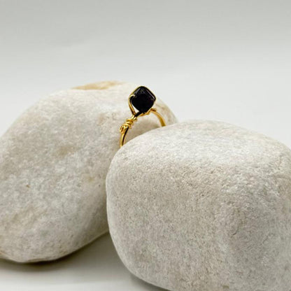 handcrafted gold ring with a deep black stone image 5