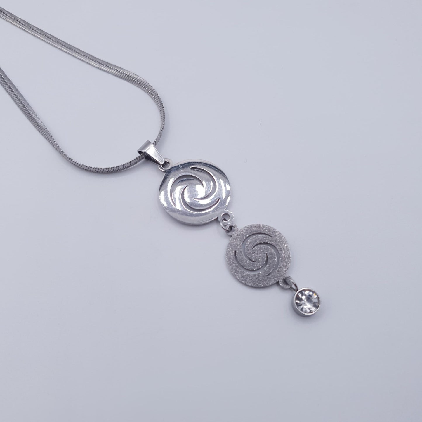 Elevate your look with this timeless spiral elegance Stainless Steel Neckace Set. image 4