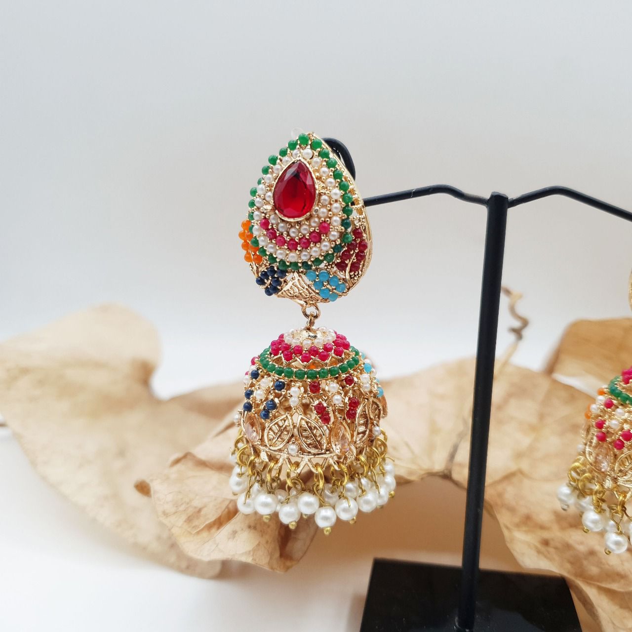 Discover timeless elegance with our Regal Pearldrop Jhumka Collection image 18