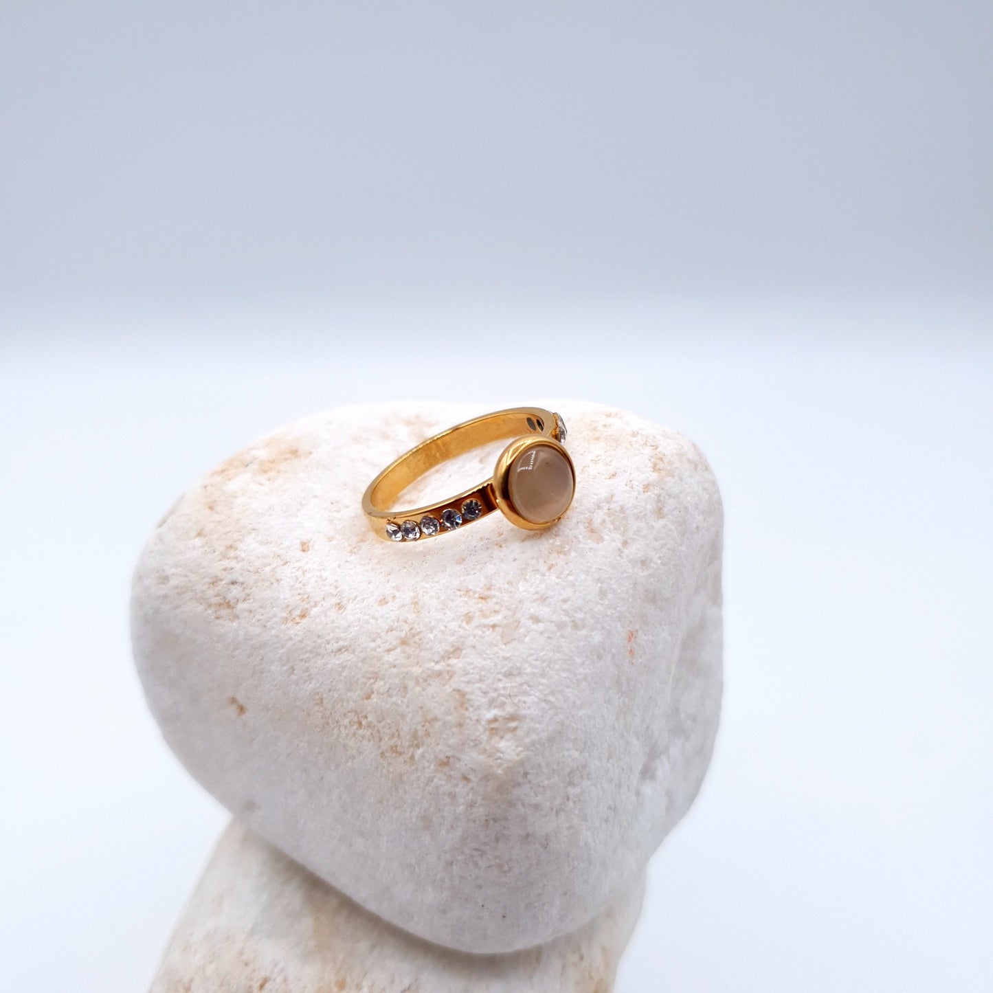 A sleek and elegant ring designed to complement the beauty of a sophisticated person image 2