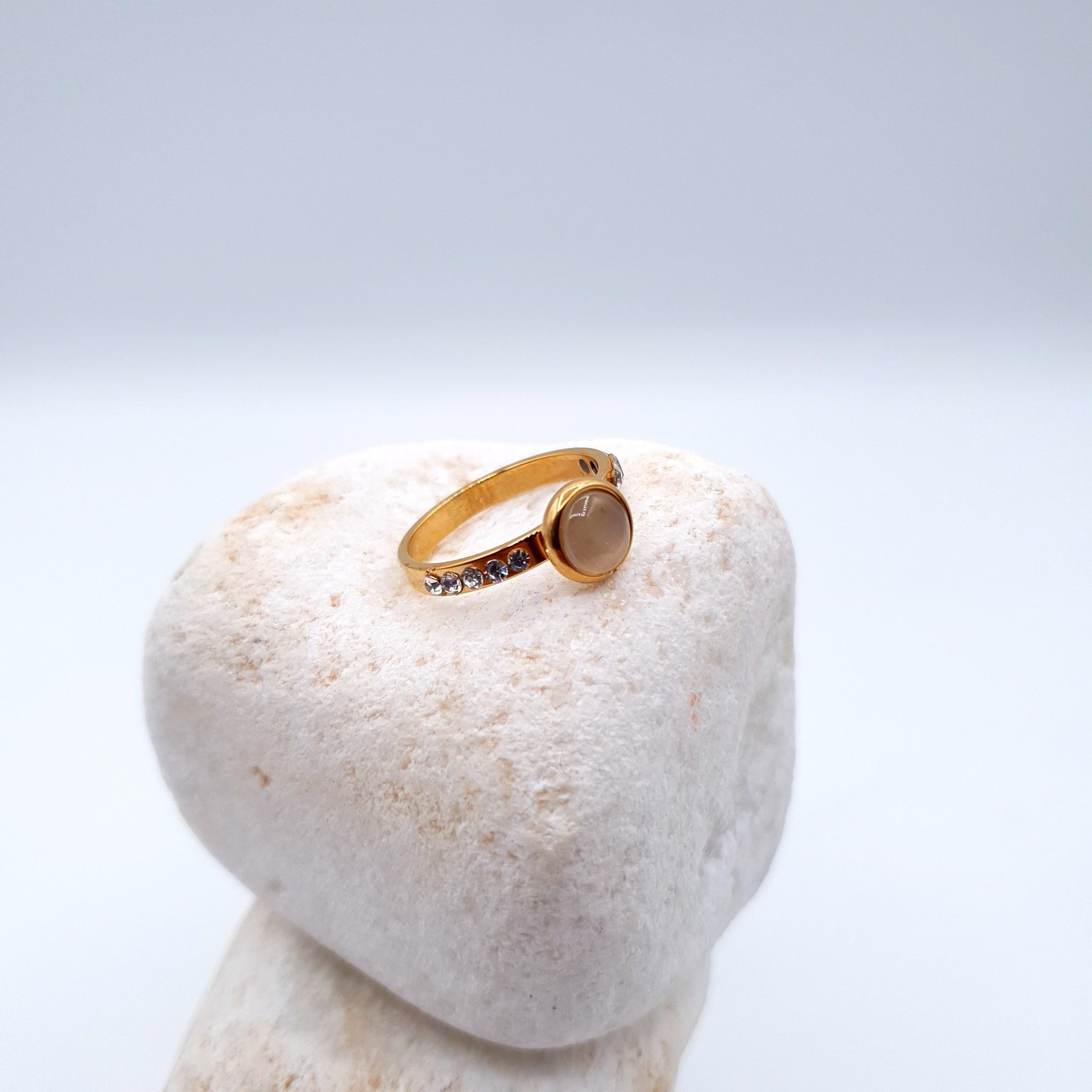 A sleek and elegant ring designed to complement the beauty of a sophisticated person image 2