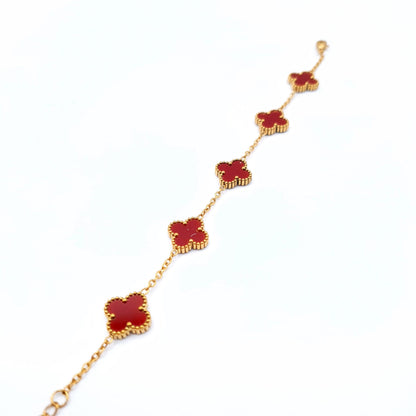 A delicate golden chain bracelet adorned with elegant flower-shaped motifs for a timeless, feminine touch. image 0