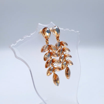 Elegant petal-shaped earrings adorned with sparkling rhinestones for a radiant, sophisticated look.(Golden = 2, Red = 1) image 6