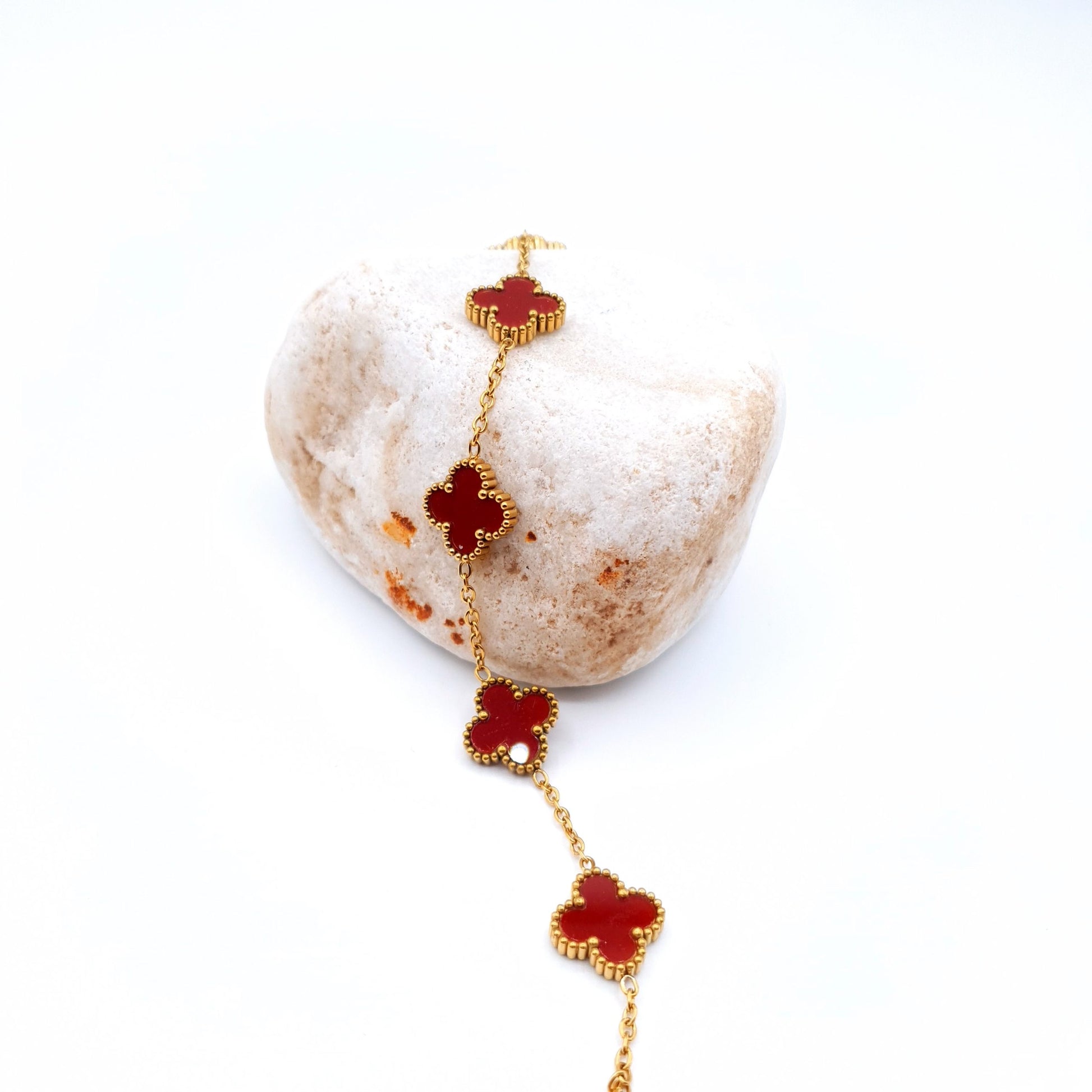 A delicate golden chain bracelet adorned with elegant flower-shaped motifs for a timeless, feminine touch. image 4