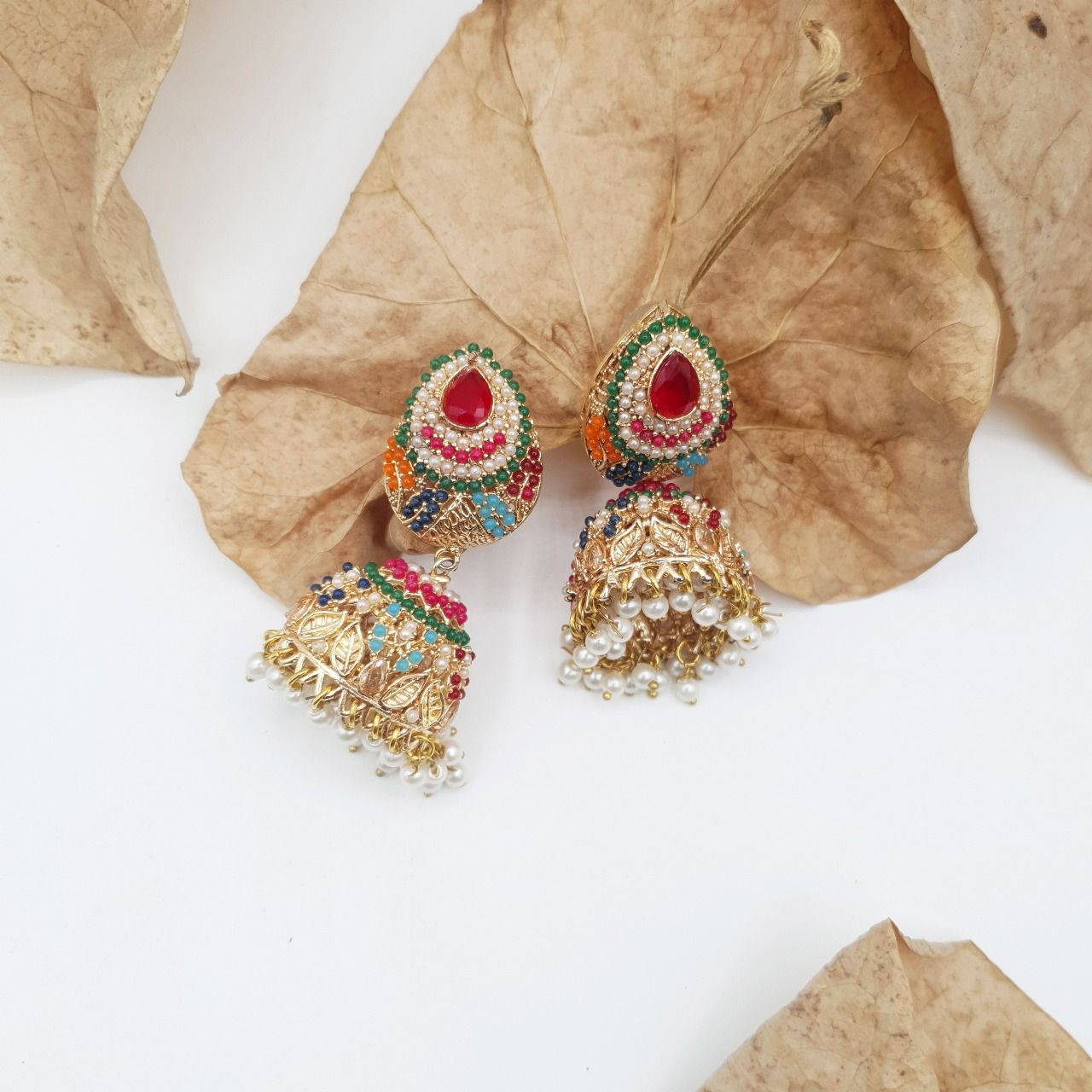 Discover timeless elegance with our Regal Pearldrop Jhumka Collection image 17