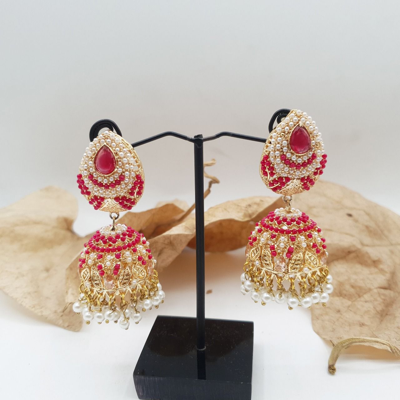 Discover timeless elegance with our Regal Pearldrop Jhumka Collection image 21
