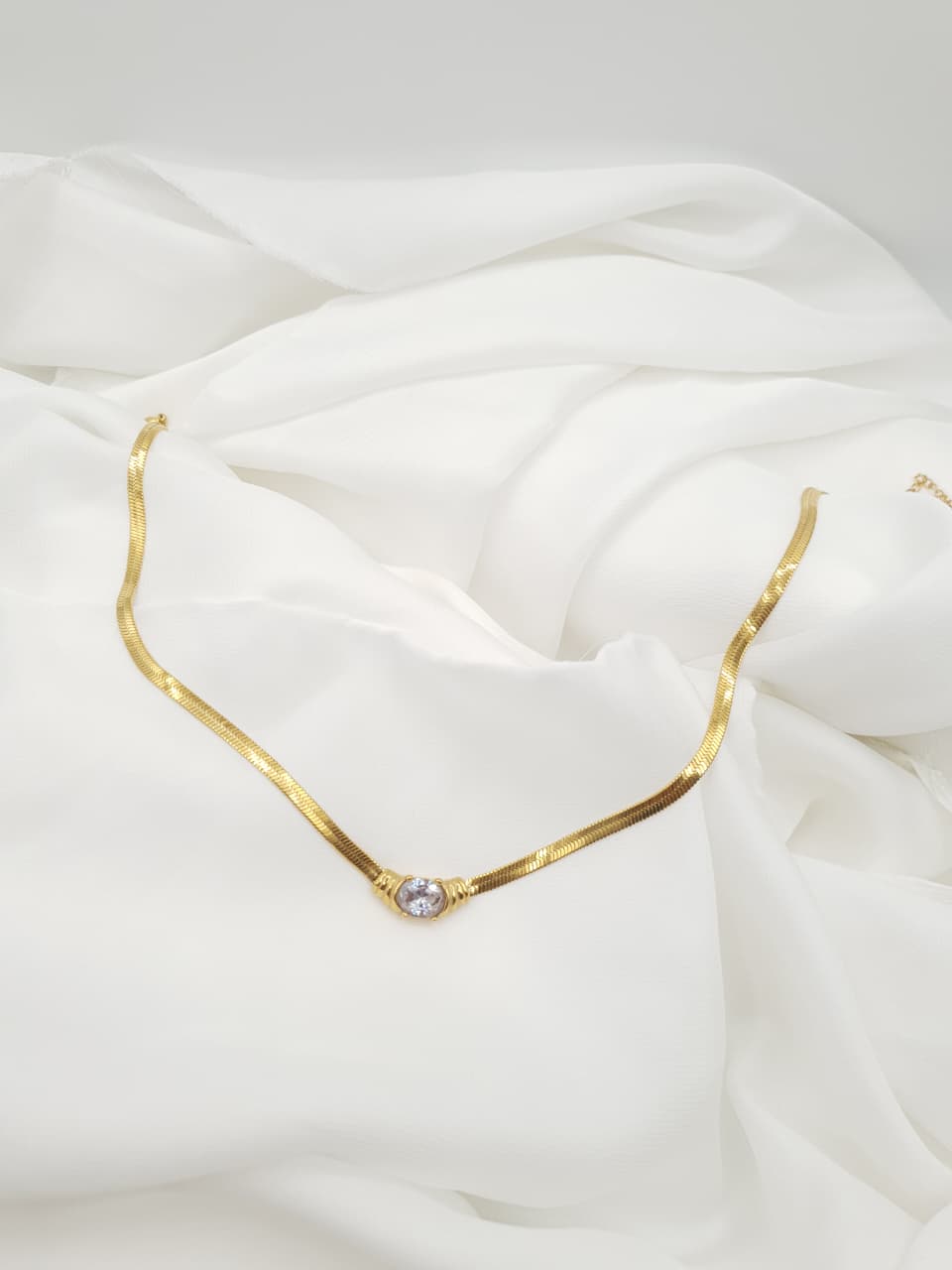Classic Gold Chain with Sparkling Center Stone