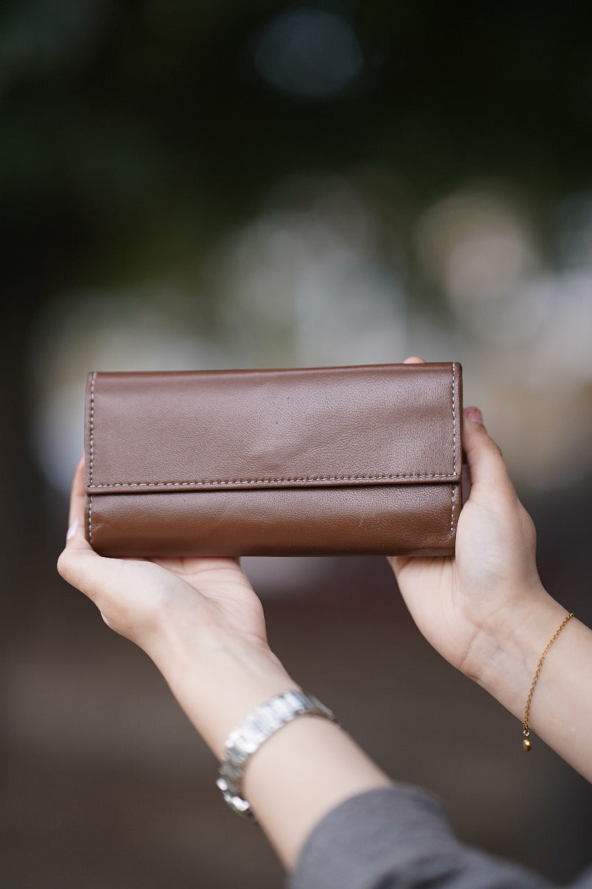 A Stylish and minimalistic genuine leather clutch with a smooth finish and straight flap design, perfect for any occasion image 0