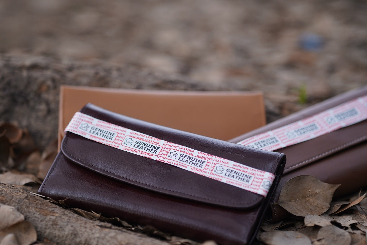 A Stylish and minimalistic genuine leather clutch with a smooth finish and curved flap design, perfect for any occasion image 6