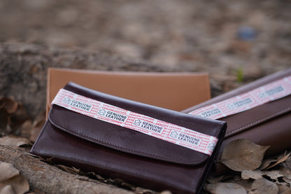 A Stylish and minimalistic genuine leather clutch with a smooth finish and curved flap design, perfect for any occasion image 6
