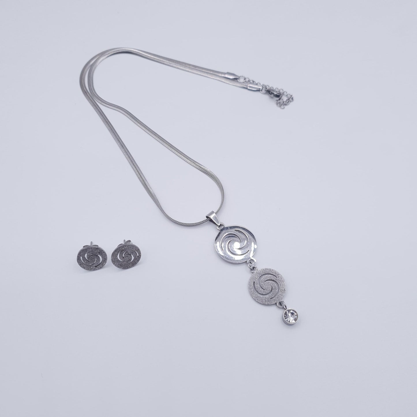 Elevate your look with this timeless spiral elegance Stainless Steel Neckace Set. image 2