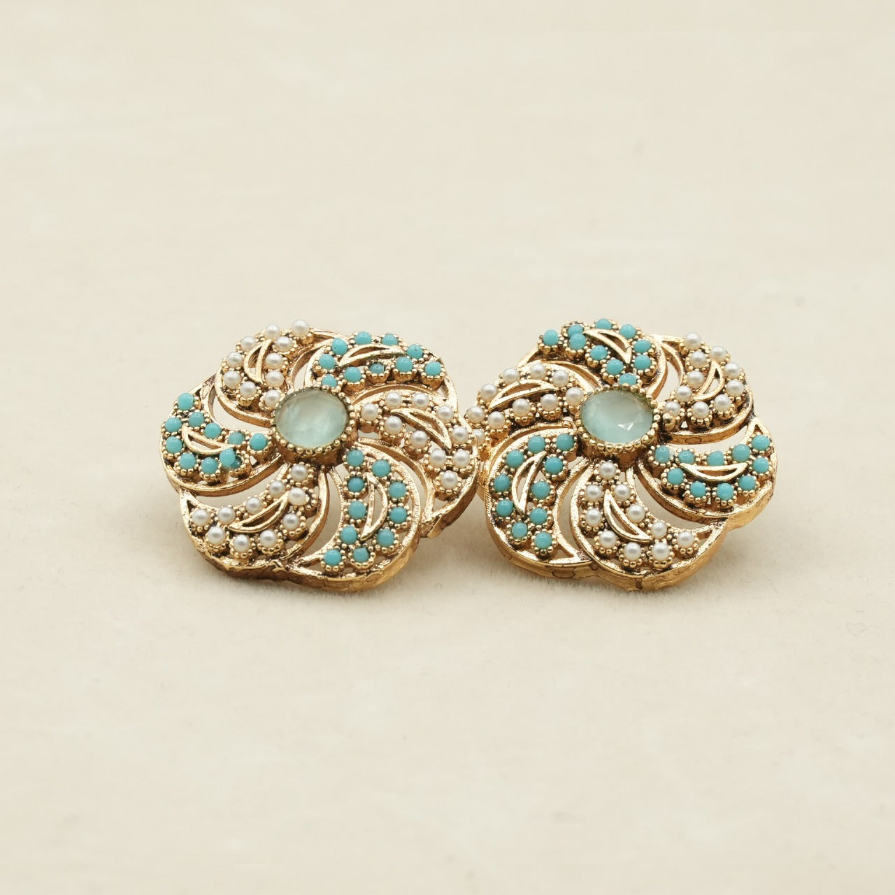 Likely gold-plated metal with a detailed filigree design image 4