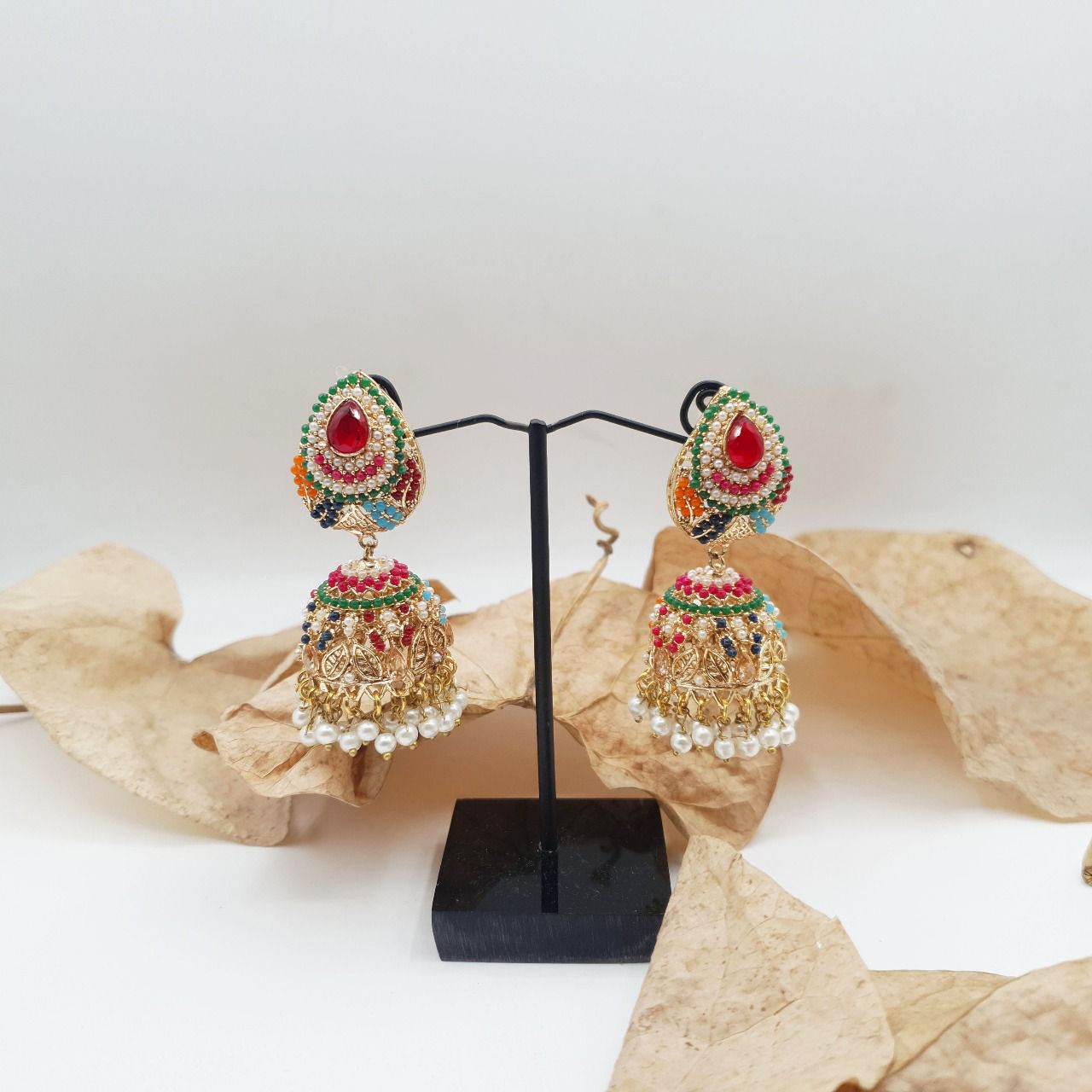 Discover timeless elegance with our Regal Pearldrop Jhumka Collection image 16